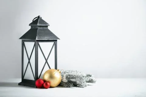 Old lantern with pine branches and ornaments Stock Photos