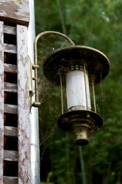 Old lantern on wall. Stock Photos