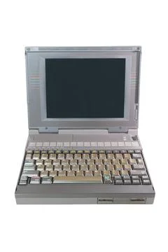 Old laptop with white background, vertical Stock Photos