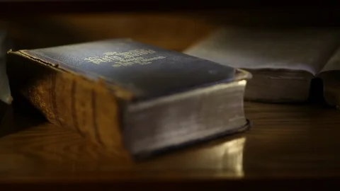 Old Large Bible Sitting On Shelf 스톡 동영상 102153036