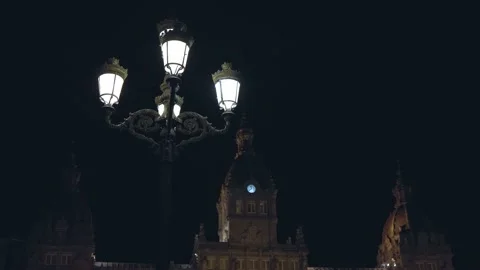 An old large lantern in the square shines at night. Stock Footage 196129514