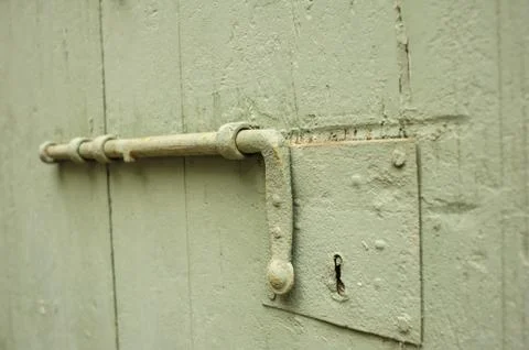 Old latch of a main door Stock Photos