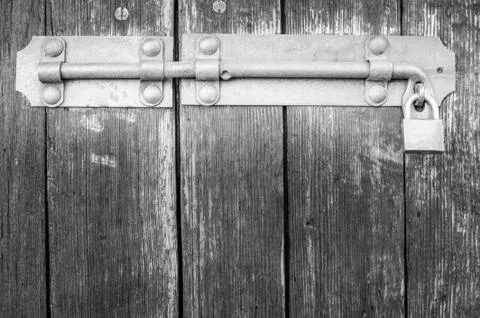 Old latch of a main door Foto stock