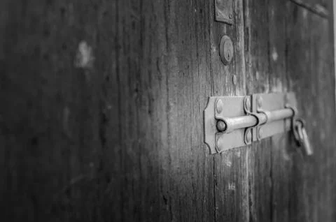 Old latch of a main door Stock Photos