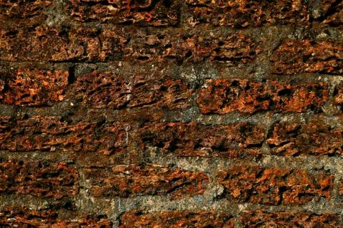 Old laterite wall laterite texture background,Pattern decorative uneven crack Foto stock