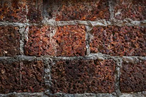 Old laterite wall laterite texture background,Pattern decorative uneven crack Stock Photos