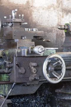 Old lathe in the workshop Stock Photos