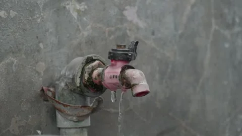 Old leaky pipes 10bit 4k 60fps Stock Footage 269428139