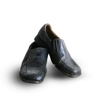 Old leather pair of shoe Stock Photos