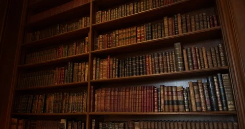 An Old Library With Ancient Books In Leather Bindings Stock Footage