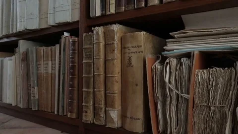 Old library full of old and precious books, shelves full of volumes Stock Footage 120037780