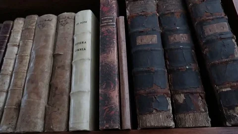 Old library full of old and precious books, shelves full of volumes Stock Footage 120037847