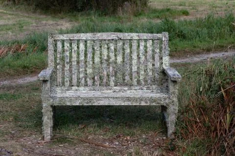  old lichen covered bench Stock Photos