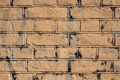 Old light beige brick wall. rough surface texture Stock Photos