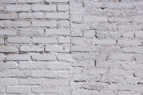Old light broken white Bricks Wall Pattern decoration texture loft interior o Stock Photos
