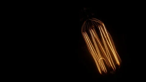 Old Light Bulb Filament Turn Off and on Close Up Stock Footage 96846152