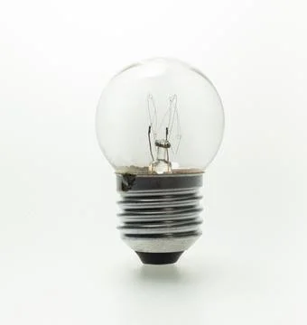 The old light bulb on the white background Stock Photos