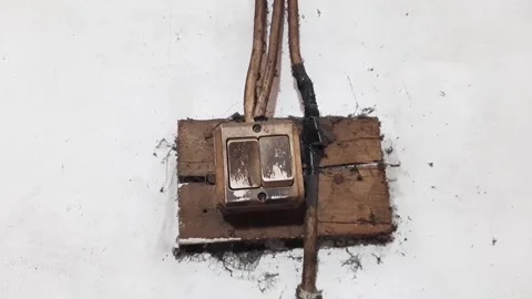 Old light switch installation with repaired broken wired Stock Footage 285834768