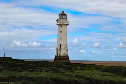An old lighthouse at the beach Stock Photos
