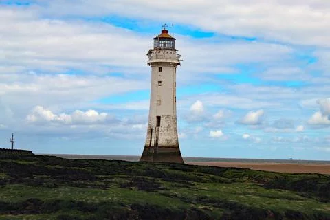 An old lighthouse at the beach Stock Photos