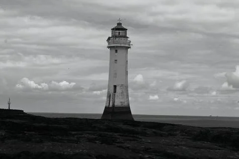 An old lighthouse at the beach Stock Photos