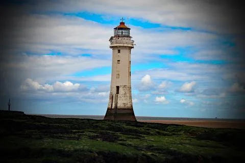 An old lighthouse at the beach Stock Photos