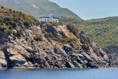 Old lighthouse on the cliff Stock Photos
