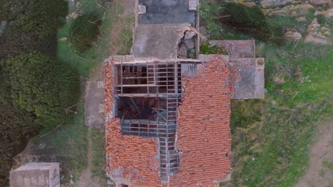 Old lighthouse on a cliff at sunset Stock Footage 230996828