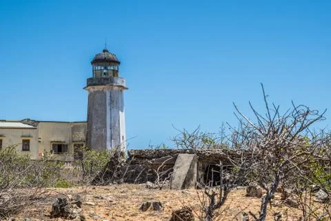 Old lighthouse in the coast Stock Photos