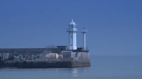 Old lighthouse on moorage Stock Footage 35187391