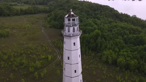Old lighthouse at ocean coastline  Stock Footage 295744712