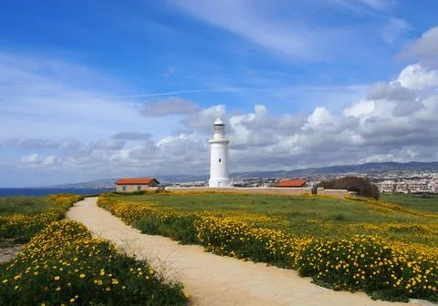  the old lighthouse in paphos cyprus surrounded by historic buildings with... Fotos de archivo