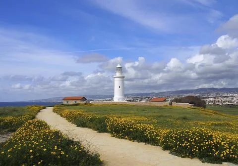 The old lighthouse in paphos cyprus surrounded by historic buildings with spring Fotos de archivo