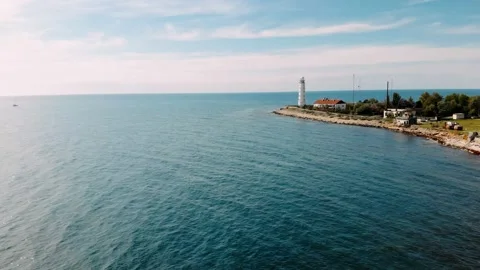  Old lighthouse on the seaside. Navigation equipment on the sea. Stock Footage 162976273