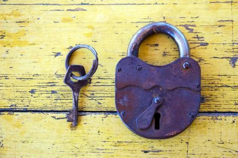 Old lock with a key Stock-Fotos