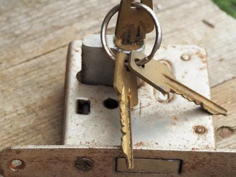 Old lock with keys covered with rust close up Stock Photos