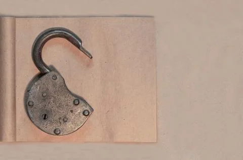 Old lock on old paper background Stock Photos