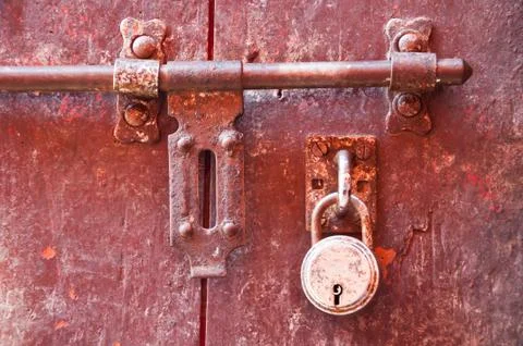 Old lock with purple door Stock Photos