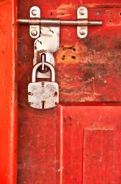 Old lock with red door Stock Photos