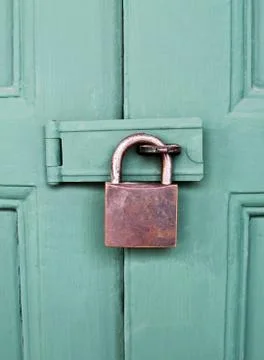 Old locked door. Stock Photos