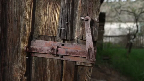 Old locking loop on a wooden door. Stock Footage 277107527