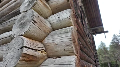 An old log cabin with decorations. Ancient wooden architecture. Stock Footage 315899794