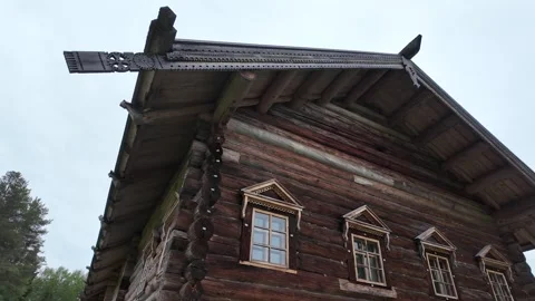 An old log cabin with decorations. Ancient wooden architecture. Stock Footage 315899872
