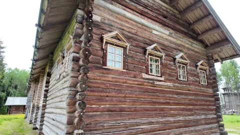 An old log cabin with decorations. Ancient wooden architecture. Stock Footage 315899888