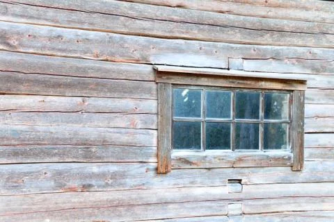 Old log house window with rustic frame, Finland Stock Photos