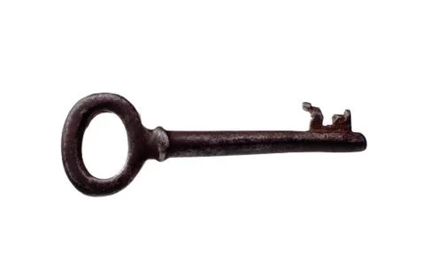 Old long rusty key isolated on a white Foto stock