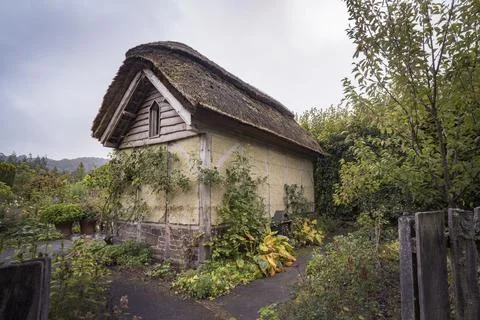 Old looking thatched building Stock Photos
