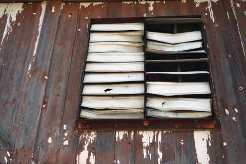 Old louvered window Stock Photos