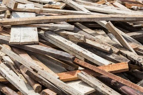 Old lumber in construction site Stock Photos