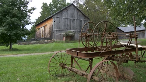Old machine and barn 4K Stock Footage 95088962